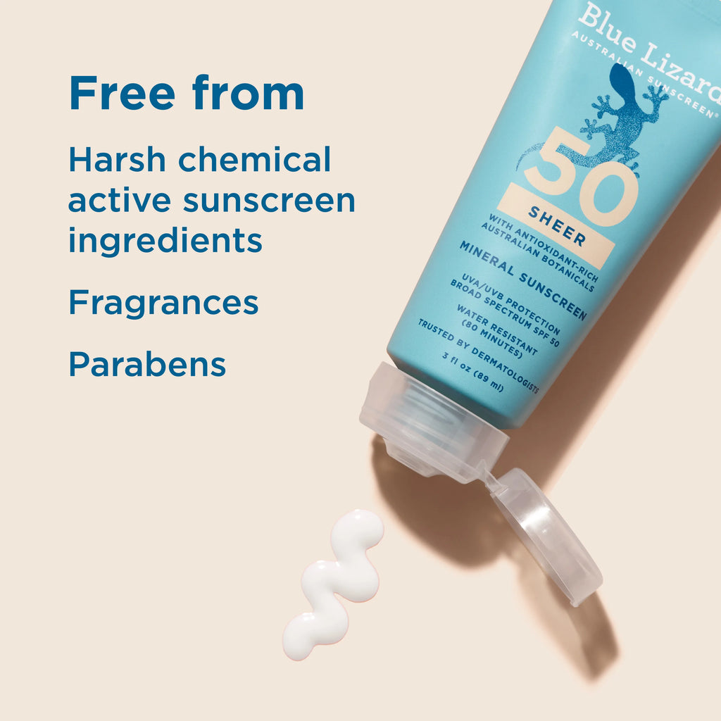 Blue Lizard Sheer SPF 50 mineral sunscreen tube with text highlighting ingredients free from harsh chemicals on a beige background